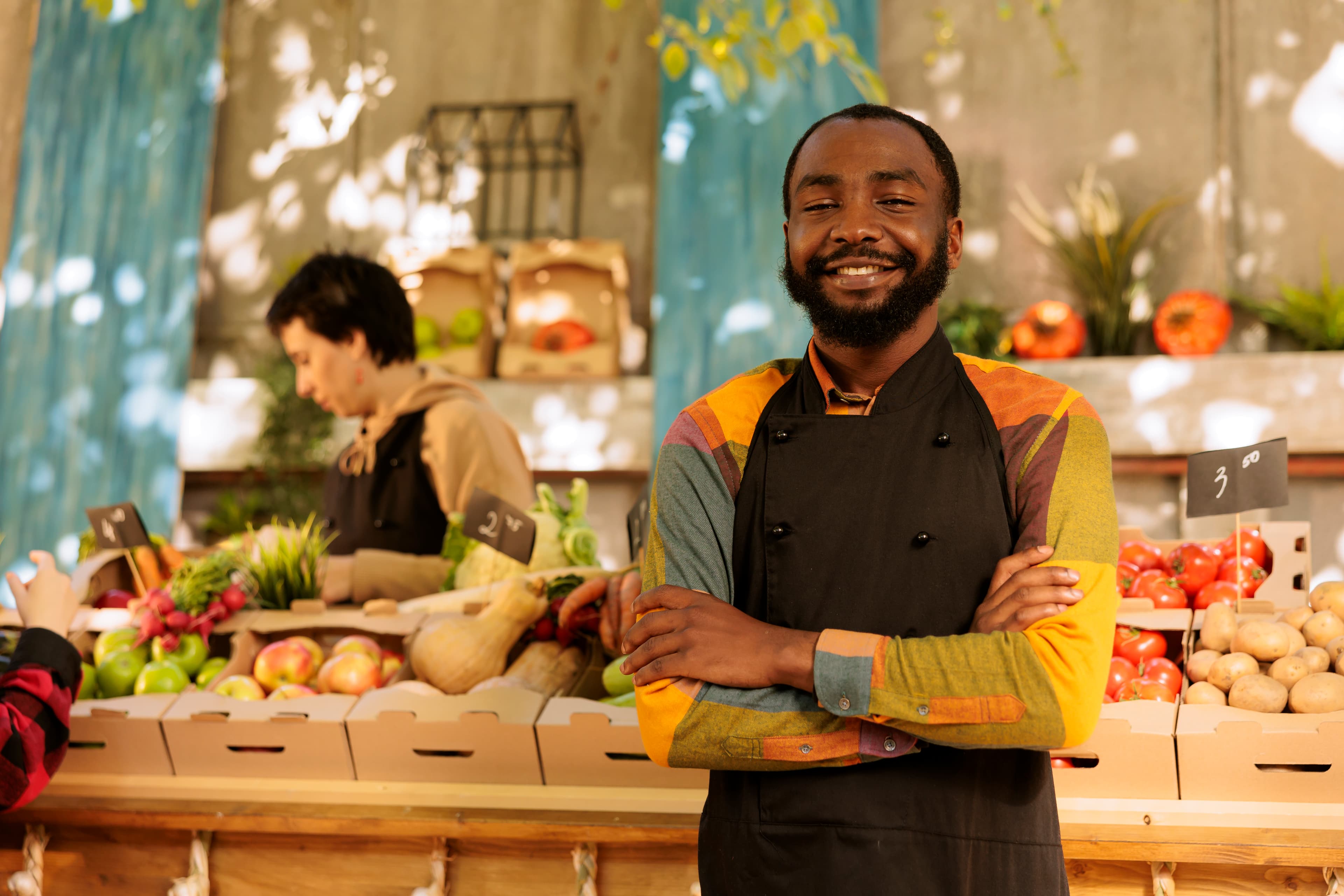 A community business owner at a local marketplace